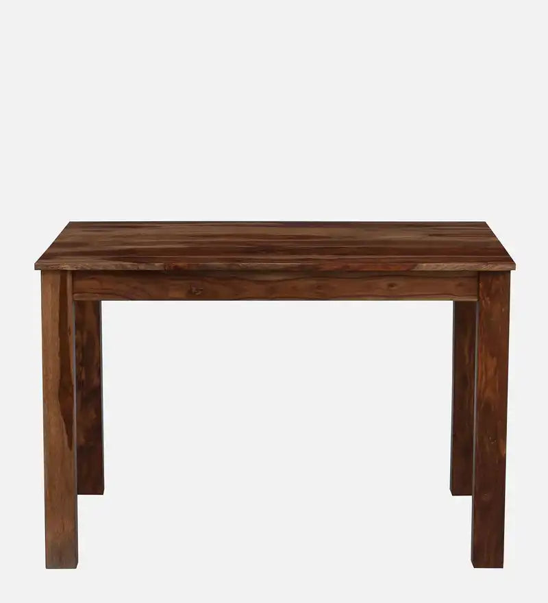 Solid wood dining table in natural finish crafted from sheesham wood for dining space