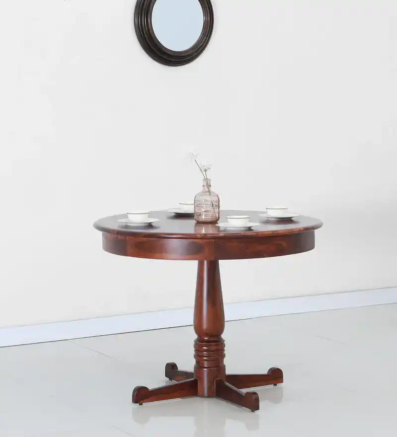 Sheerel sheesham wood round dining table made from premium solid wood for modern Indian homes