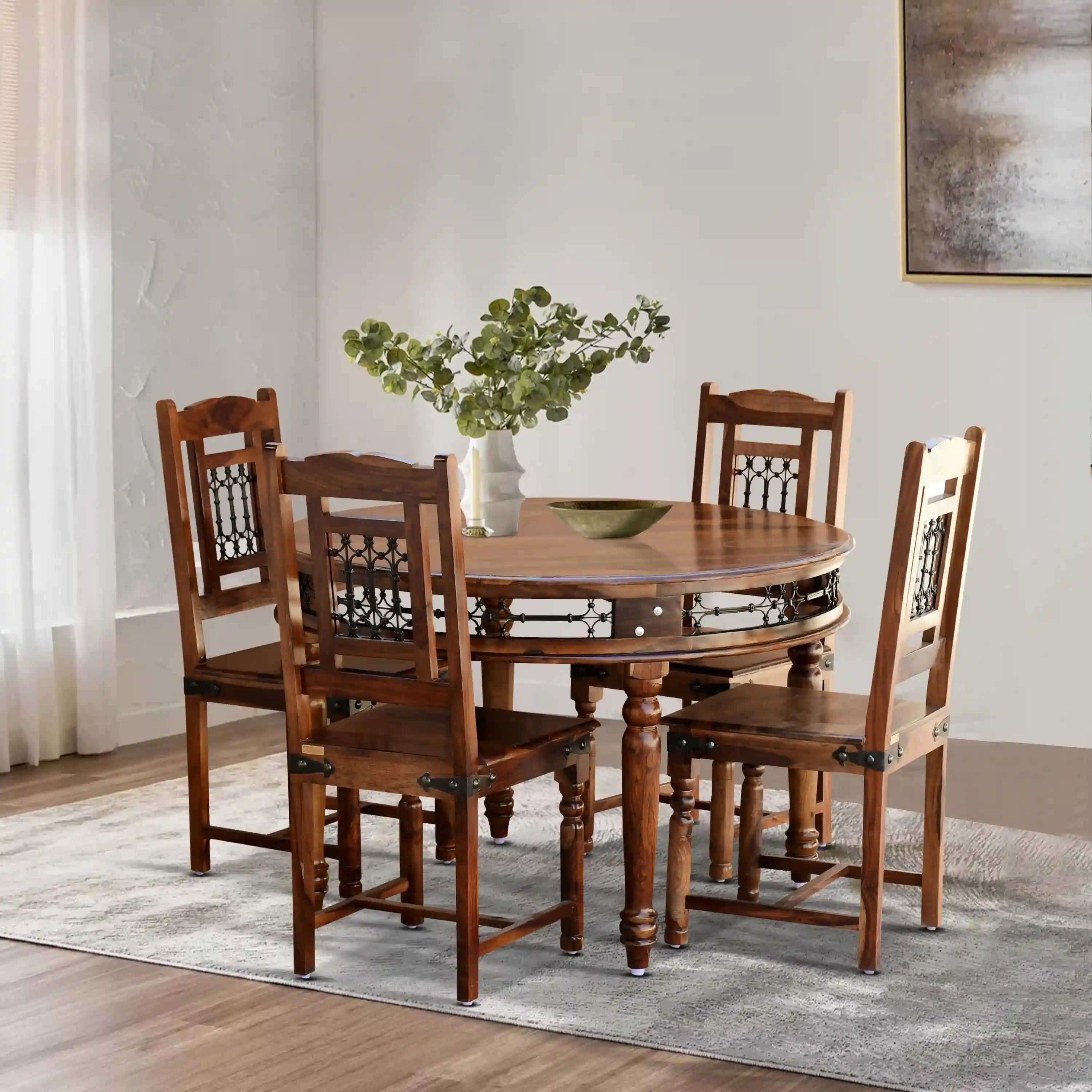 Haveli solid wood round four seater dining table set premium wooden furniture India