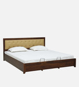 Lucia Solid Wood Upholstered Bed With Hydraulic Storage In Provincial Teak Finish By Rajwada