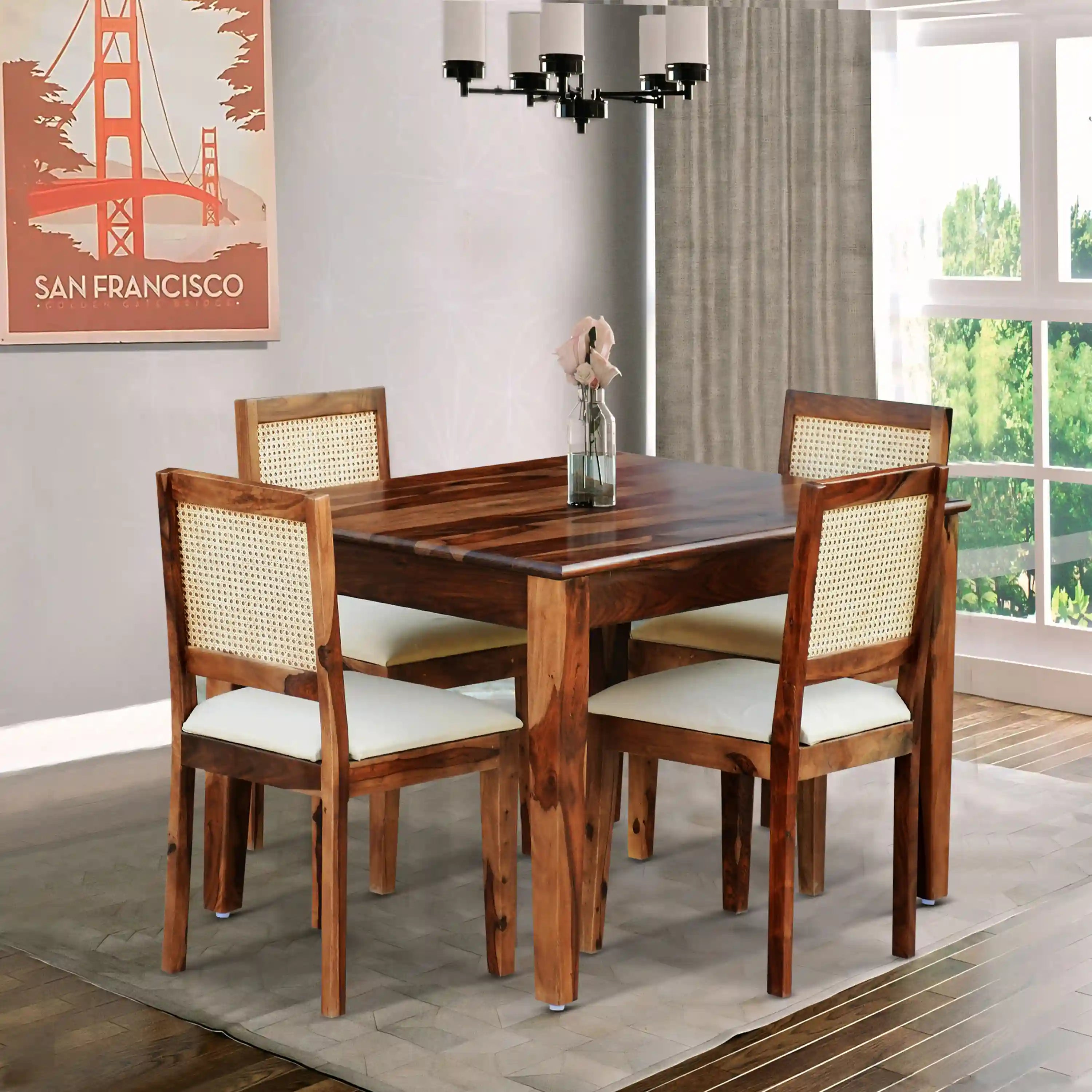 Rattan solid wood cane four seater dining table set handcrafted premium furniture India