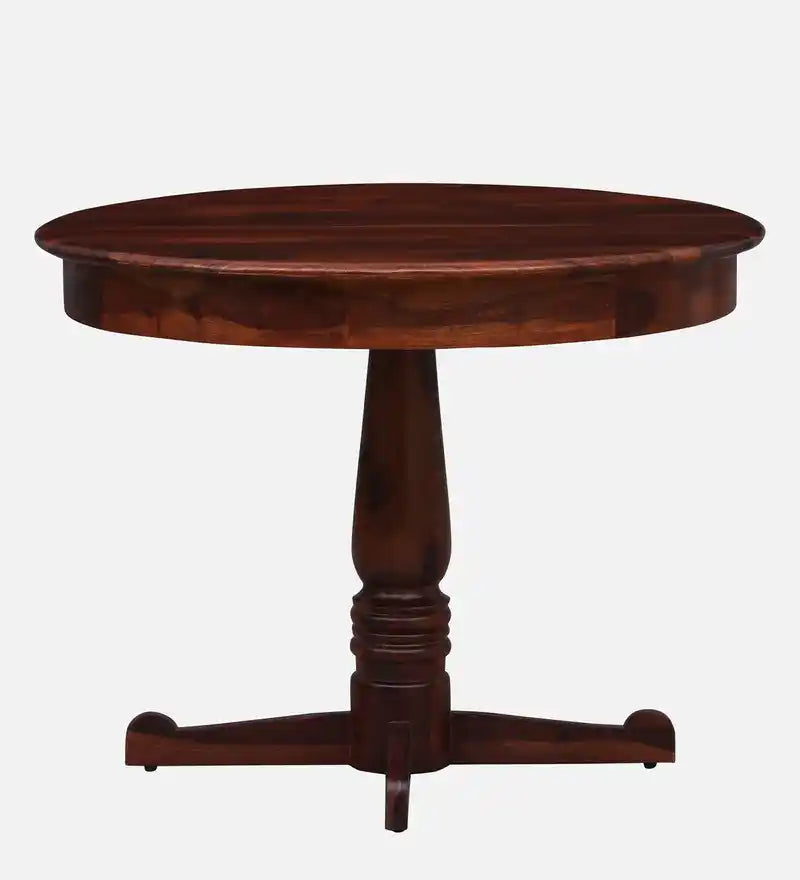 Sheerel round dining table in sheesham wood ideal for compact dining spaces