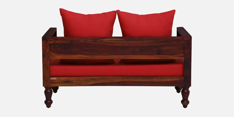 Anamika Sheesham Wood 2 Seater Sofa In Honey Oak Finish by Rajwada  With Red Cushioned Chair