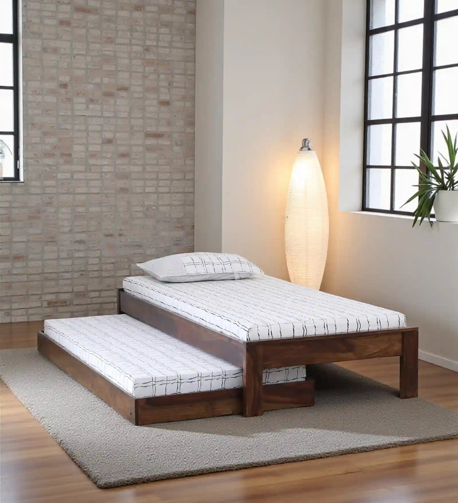 sthira solid sheesham wood single bed with trundle front view pull out bed modern wooden design