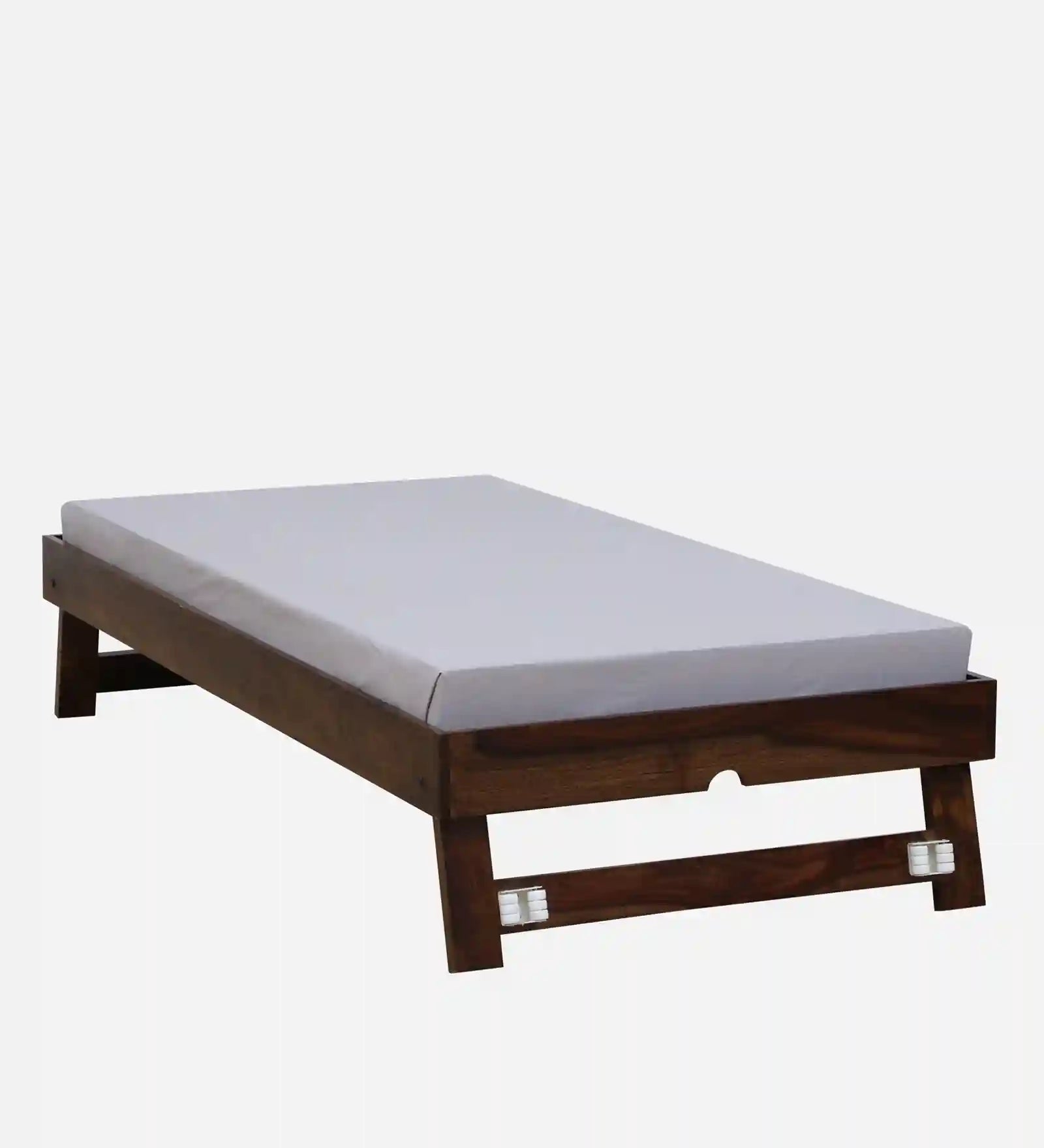 sthira solid sheesham wood single bed with trundle styled in modern bedroom setup space saving design